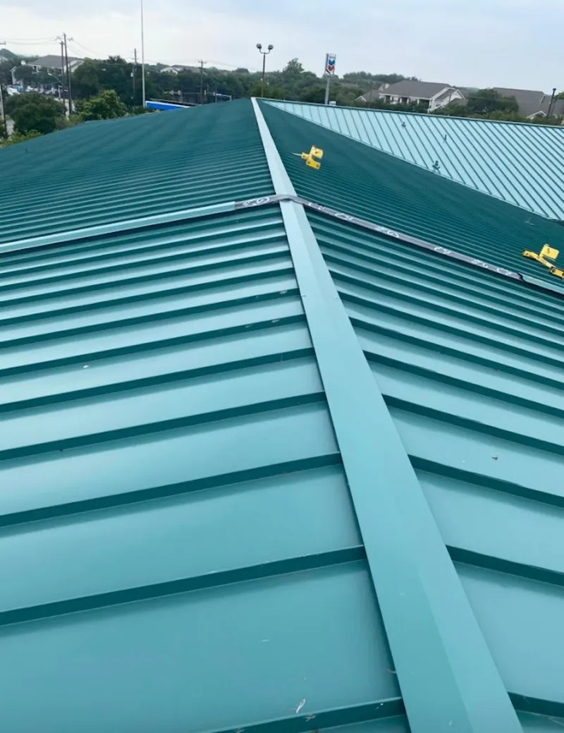 Green commercial metal roof ridge and valley for Metal Roof Repair in Columbia