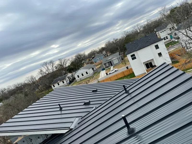 Standing seam metal roof panels with vents for Skylight Repair in Columbia